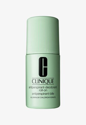 Clinique rullede antiperspirant i en lys grøn cylindrisk beholder med et ribbet låg; har sort tekst og logo.