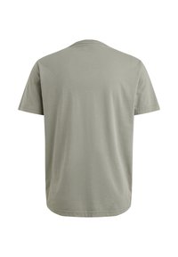 Camiseta de manga corta color verde oliva con cuello redondo, hecha de algodón suave. Presenta un dobladillo recto y costuras mínimas para un diseño limpio.