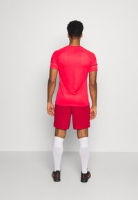 Nike Performance Calções desportivos - university red/white