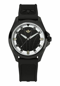 Montre analogique noire avec un cadran noir texturé et des index horaires blancs. Équipée d'un bracelet en caoutchouc noir et d'accents dorés sur le cadran.