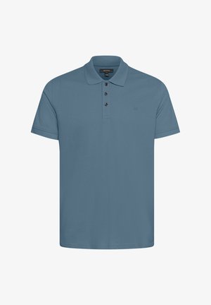 Polo in azzurro chiaro, realizzato in morbido tessuto di cotone. Presenta un colletto classico, una chiusura a tre bottoni e un discreto logo del brand.