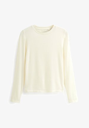 Ilga natūralios spalvos ribota medvilnės palaidinė su apvalia iškirpte ir tiesia apačia. Paprastas dizainas be matomų raštų ar akcentų.