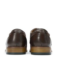 Brown leather shoes with a smooth finish, rounded backs, and stacked wooden heels. The soles are dark, contrasting with the lighter heel color.