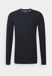 Svart stickad tröja med rund halsringning, långa ärmar och ett strukturerat mönster. Har ribbade manschetter och nederkant för en säker passform.