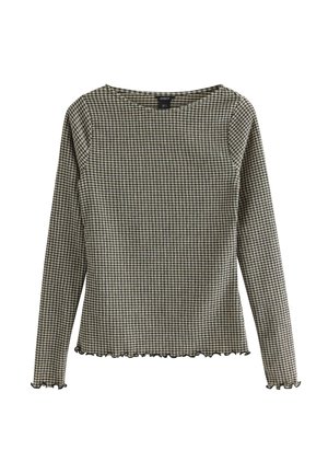 Langærmet, tætsiddende top med lille sort og hvid ternet mønster, rund halsudskæring og flæsekant på ærmer og kant.