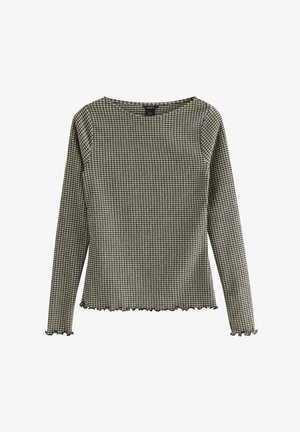 Langærmet, tætsiddende top med lille sort og hvid ternet mønster, rund halsudskæring og flæsekant på ærmer og kant.