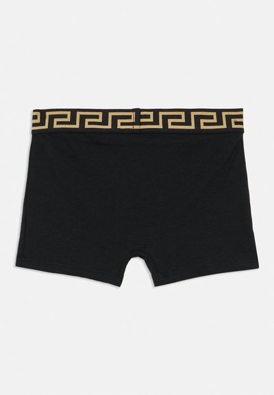 Melni boksa šorti ar pieguļošu dizainu, elastīgā jostā ar zelta grieķu atslēgas rakstu. Mīksts, elastīgs audums.