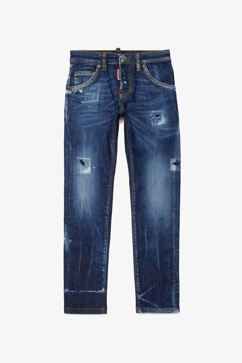 Jeans in denim blu scuro con vestibilità slim, caratterizzati da toppe strutturate, scoloriture e cuciture arancioni a contrasto lungo le cuciture.