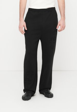 CROSS PATCH - Tepláky - black