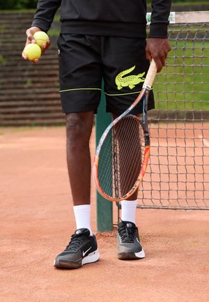 Pantaloncini sportivi - black/fluo yellow