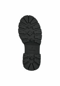 Semelle en caoutchouc noir avec des motifs profonds et définis. Présente un logo central et la taille "37" en relief. Durable et conçue pour l'adhérence.