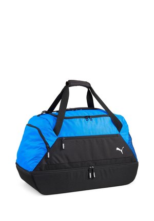 Blauer und schwarzer Puma-Sport-Duffelbag mit zwei Griffen, mehreren Reißverschlussfächern und dem Puma-Logo auf der Vordertasche.