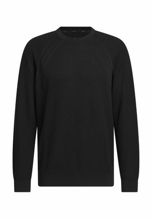 Suéter negro con cuello redondo acanalado, mangas largas y tela texturizada. Presenta costuras raglán y puños ajustados.