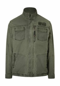 Olivgrüne Jacke aus Baumwolle mit Stehkragen. Verfügt über zwei Brusttaschen und zwei Seitentaschen, elastische Bündchen und einen Frontreißverschluss.