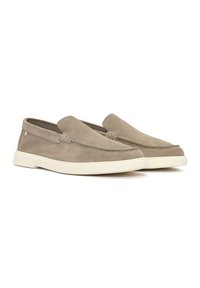 Slip-on shoes made of beige suede with a smooth texture, featuring contrasting white rubber soles and subtle stitching detail.