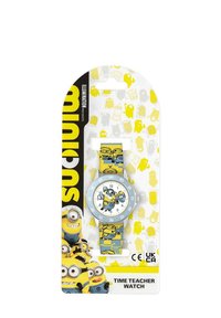 Minions klok met een zilveren bezel, witte wijzerplaat en gele siliconen band met patronen van cartoon Minions.