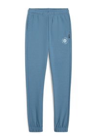 Blå joggers i mjukt tyg, med sidfickor, elastiska muddar och en liten vit grafisk design på vänster ben.
