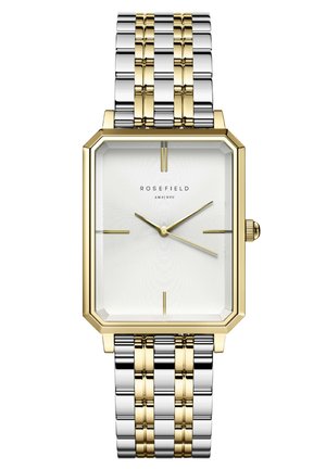 Montre rectangulaire Rosefield avec un bracelet en acier inoxydable argenté et doré. Cadran texturé blanc, index en or et design minimaliste.
