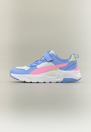 Blue and white athletic sneaker with pink stripe, yellow accents, Velcro strap, and thick white sole on neutral background.