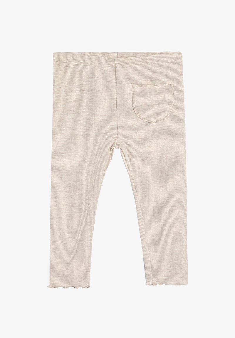 Jasbeżowe, prążkowane legginsy z falbaniastym wykończeniem i jedną kieszenią z tyłu. Wykonane z miękkiego, teksturowanego materiału dla wygody.