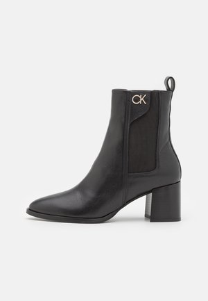 ALMOND - Classic ankle boots - black