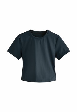 Kortärmad, croppad T-shirt i mörk marinblå, tillverkad av smidigt, stretchigt tyg med rund halsringning och minimalistisk design.