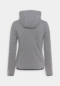 Felpa con cappuccio a maniche lunghe in un motivo geometrico bianco e nero. Presenta un tessuto morbido e un design aderente con orlo arrotondato.