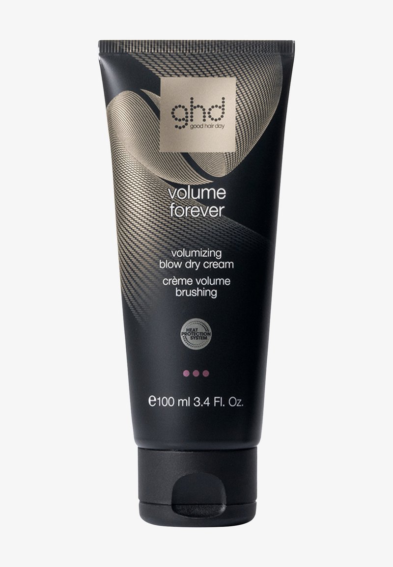 Tube en plastique noir avec un motif tourbillon doré et blanc. Contient une crème de coiffage volumisante, taille de 100 ml, avec une icône de protection contre la chaleur.
