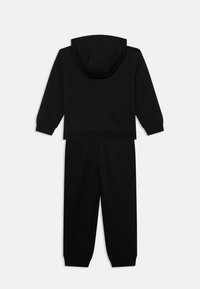 Black hoodie and sweatpants set, made of soft fabric. Hoodie features a drawstring, ribbed cuffs, and relaxed fit; pants are tapered with elastic cuffs.