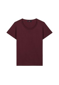 Camiseta de algodón burdeos con mangas cortas, escote redondo y un pequeño logo en la parte inferior izquierda. Textura suave, diseño sencillo.