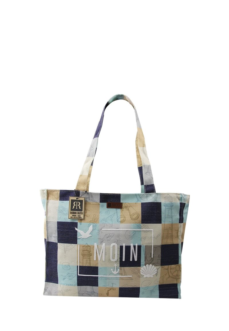 Tote bag met een patchwork ontwerp in beige, blauw en marineblauw. Bevat het woord "MOIN" in het wit, met nautische iconen en een duurzame stoftextuur.