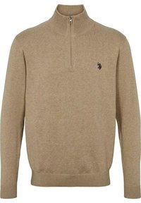 Beżowy sweter z zamkiem na szyi, wykonany z miękkiego materiału dzianinowego. Posiada długie rękawy, ściągacze u rękawów oraz małe logo na klatce piersiowej.