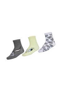 Tre paia di calze di cotone: grigie con coniglio dei cartoni, gialle con uccello dei cartoni e bianche con testo e grafiche nere ripetute.