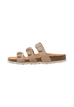 Sandalia beige de tres tiras con hebillas ajustables, plantilla de corcho y suela blanca texturizada diseñada para la comodidad casual.