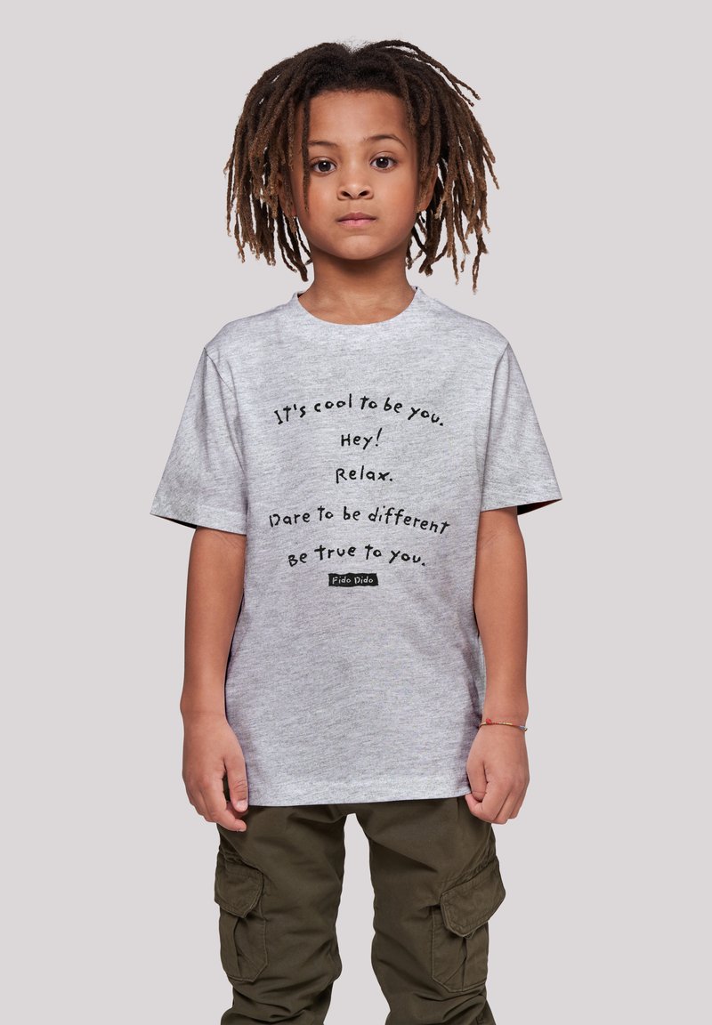 Gray cotton t-shirt with short sleeves featuring black text that reads motivational phrases. Worn with green cargo pants.