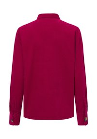Long-sleeve shirt in vibrant magenta, cotton material, featuring a standard collar, buttoned cuffs, and a smooth texture.