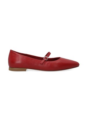 Red leather flat shoe with a rounded toe, fitted ankle strap adorned with a small metal buckle, and a low brown sole.