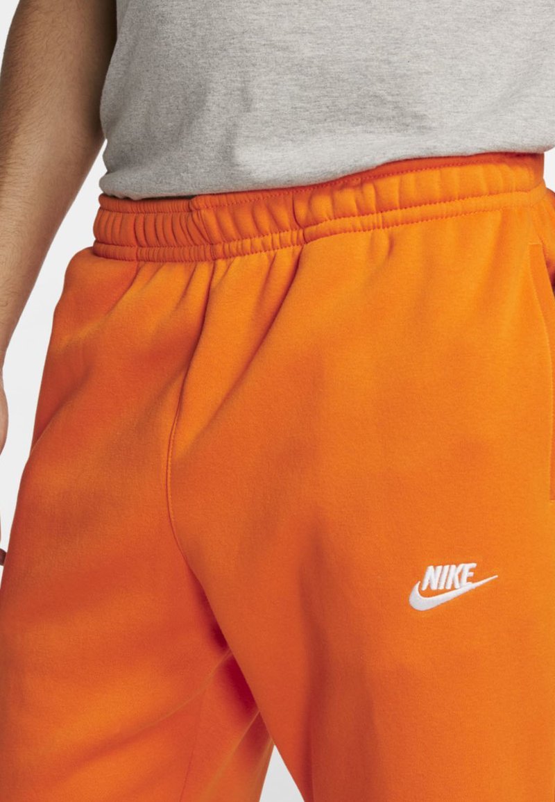 pantalon nike homme orange