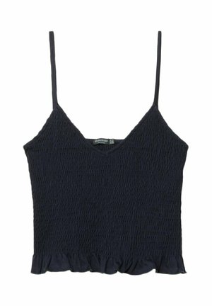 Top court smock bleu marine avec des fines bretelles réglables et un ourlet volanté. Fabriqué en tissu léger avec une surface texturée.