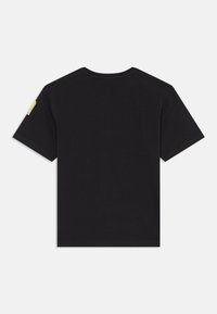 Black cotton t-shirt with short sleeves, rounded neckline, and a logo patch on the left sleeve. Plain back design with no additional patterns.