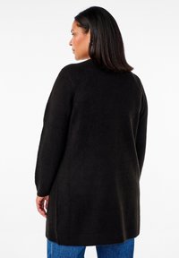 Zizzi LANGE MIT TASCHEN - Adīta jaka - black