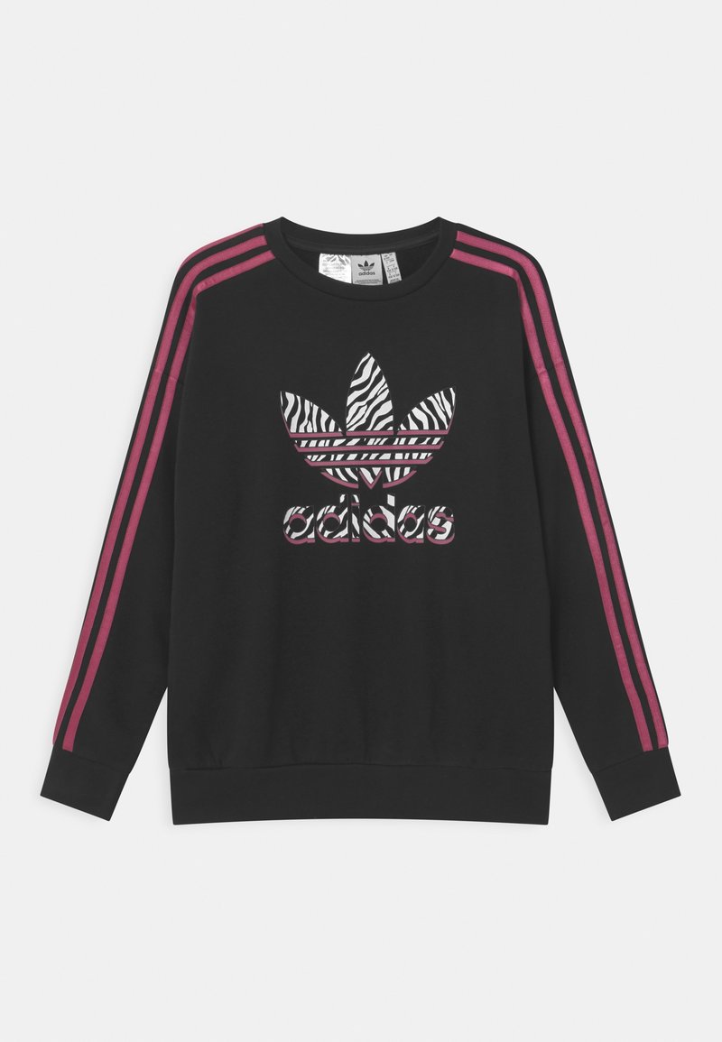 Sweat-shirt noir avec des rayures roses sur les épaules, un logo Adidas à motif zèbre sur le devant, et des poignets et un ourlet côtelés.