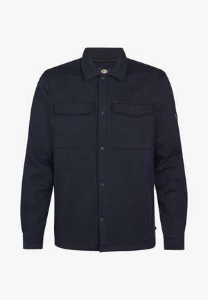 Veste en polaire bleu marine foncé avec fermeture à boutons, deux poches sur la poitrine et des poches latérales. Présente un tissu texturé et un design de col classique.