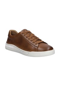 Brown leather sneaker with lace-up front, white rubber sole, rounded toe, and subtle stitching detail on the side. Simple and modern design.