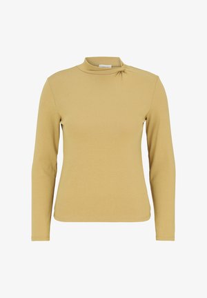 T-shirt à manches longues de couleur jaune moutarde, avec un col haut et un détail froncé sur l'épaule gauche. Fabriqué en tissu doux et extensible.