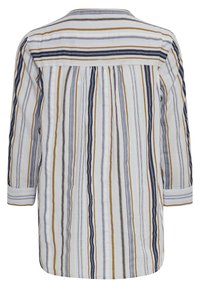 Chemise à manches longues avec des rayures verticales en blanc, bleu marine, gris et beige, vue de dos avec un empiècement et des manches à revers.