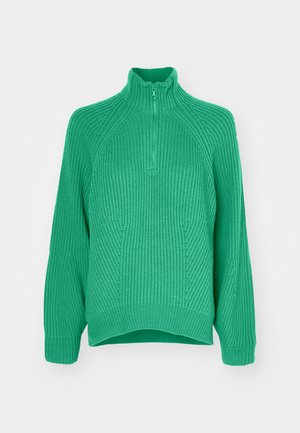 Green knit sweater featuring a high collar, quarter zip, and textured patterns with ribbed cuffs. Loose fit with a slightly curved hem.