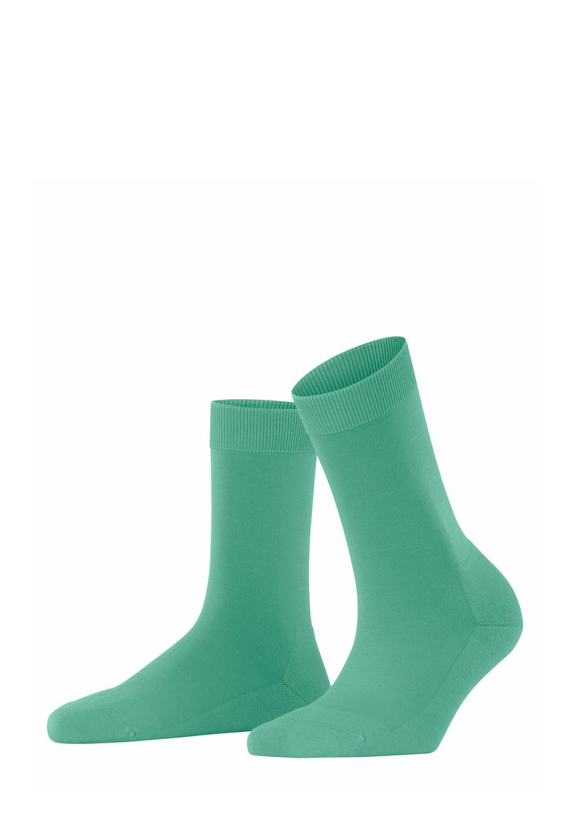 Grüne Baumwollsocken mit glatter Textur, geripptem Bündchen und mittellangem Design, geeignet für den Alltag.