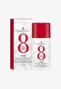Bottiglia bianca con tappo rosso e dettagli rossi, etichettata "Eight Hour SPF 40". Viene fornita in una scatola rossa con motivi astratti bianchi. 50 ml.
