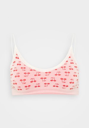 Lichtroze bralette met dunne bandjes, voorzien van een herhalend kerspatroon en kantafwerking langs de halslijn. Geribbelde textuur overal.